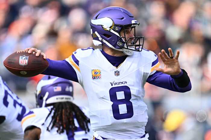 Oct 15, 2023; Chicago, Illinois, USA; Minnesota Vikings quarterback Kirk Cousins (8) passes in the first half against the Chicago Bears at Soldier Field.